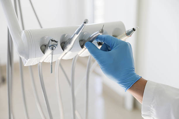 Professional Tooth Extraction technician working in University at Buffalo, NY